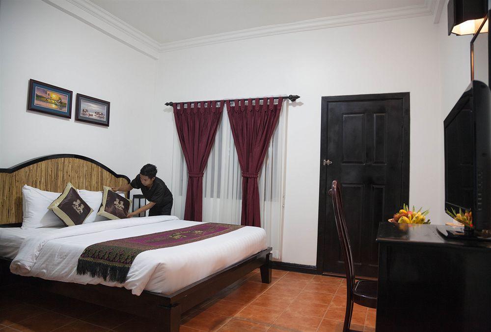 洱湾精品酒店wind Boutique Hotel Ciudad de Siem Riep Habitación foto