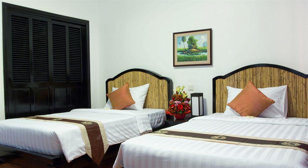 洱湾精品酒店wind Boutique Hotel Ciudad de Siem Riep Habitación foto